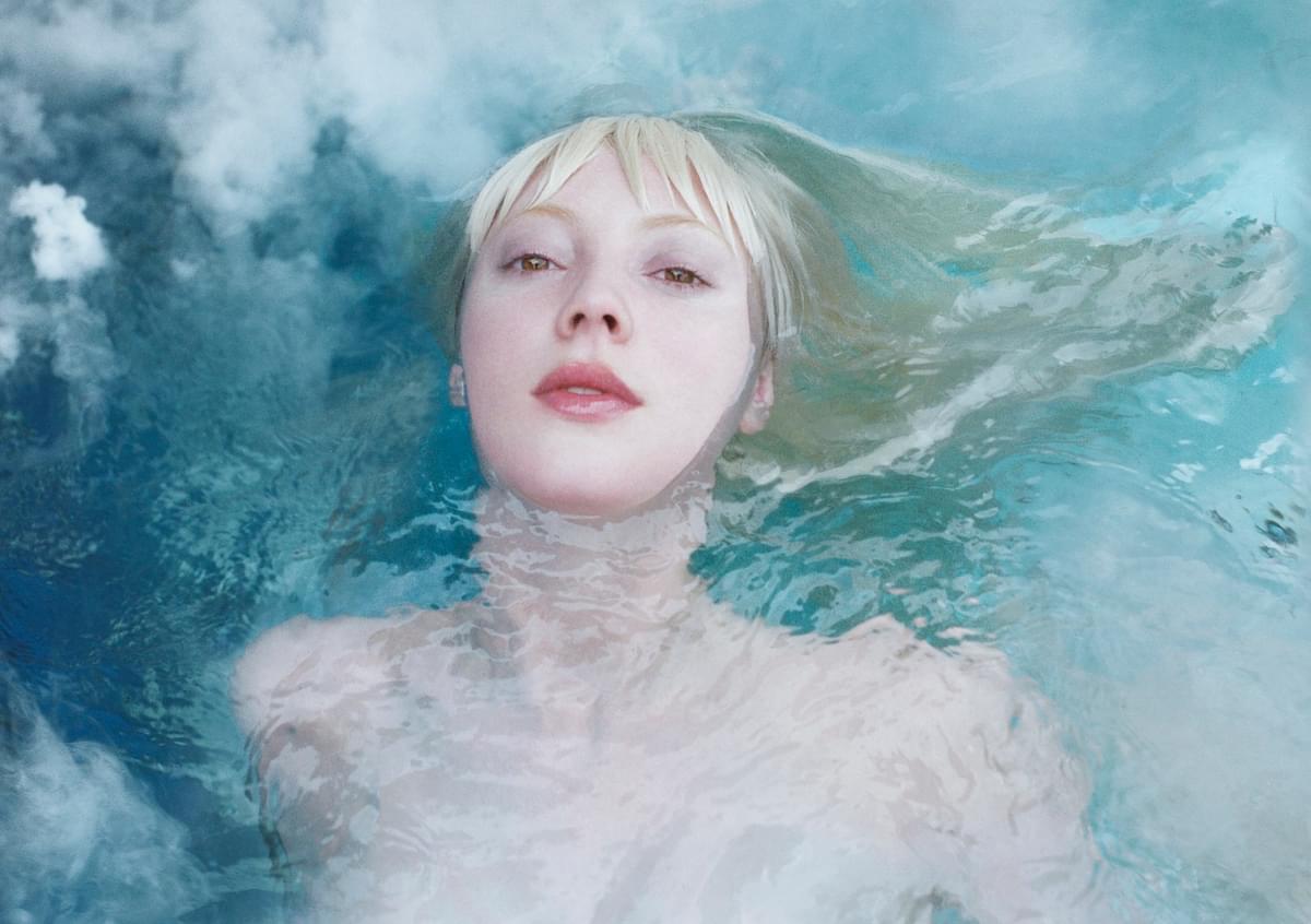 Hyd submerged in water with head tilted back for CLEARING album cover