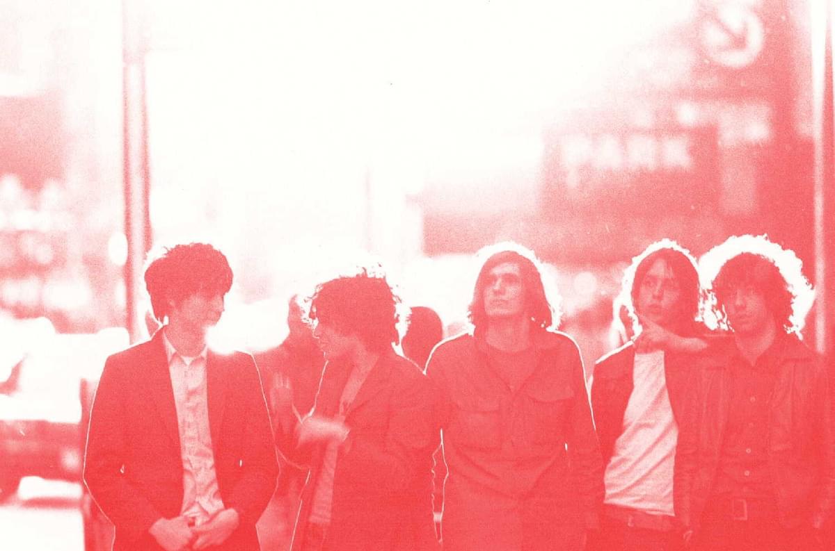The Strokes red filter outdoors