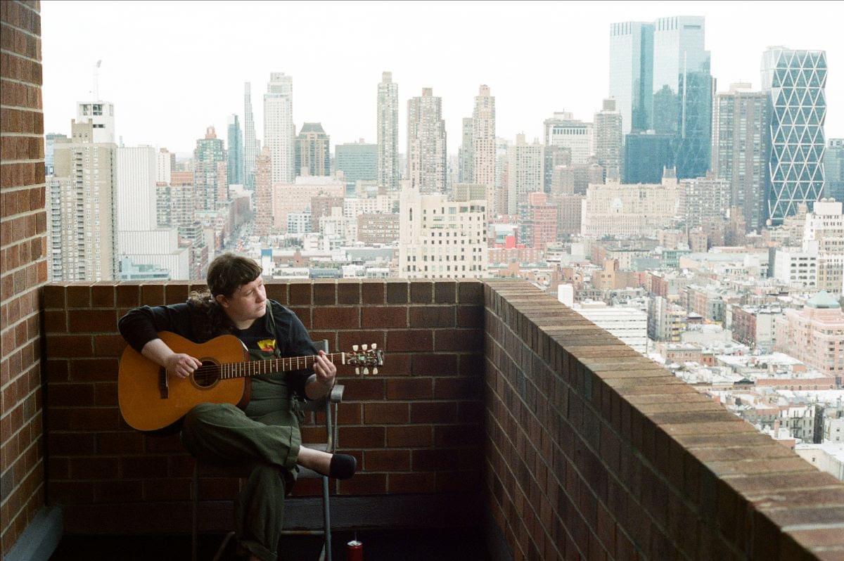Joanna sternberg balcony with guitar